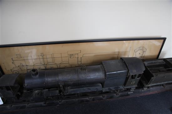 A scratchbuilt model of a 262 steam powered locomotive and tender,